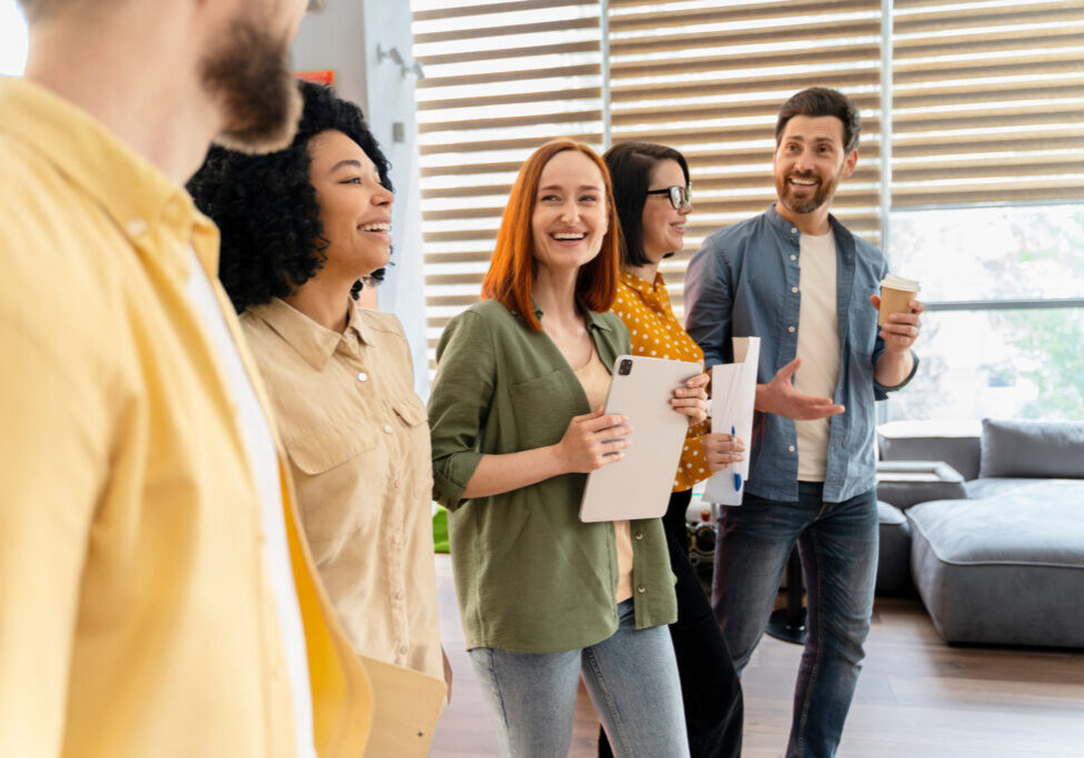 Happy multi ethnic team, diverse colleagues in office interior. People. Human resources. Career Happy multi ethnic team, diverse colleagues in office interior. People. Human resources. Career